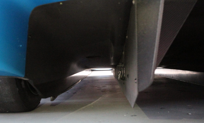 The attachment for the transponder used to time the car’s laps was still on the car in one air channel under the car. Photo credit: Stef Schrader